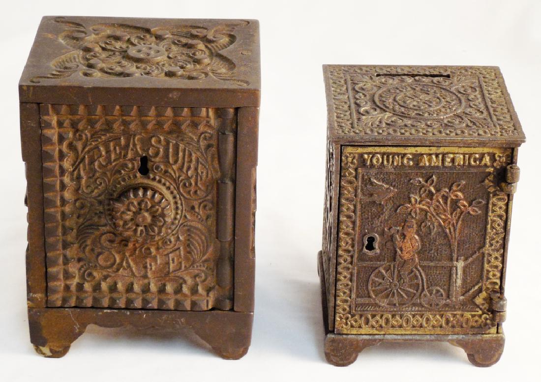 Lot of 2 Cast Iron Banks: Teasure Safe with dial and "Young America"