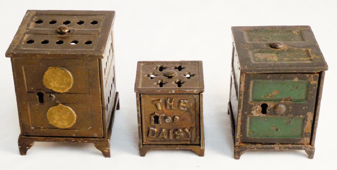 Lot of 3 Cast Iron Banks: smallest in "The Daisy"
