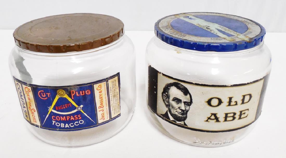 Lot of 2 Glass Tobacco Jars: Old Abe measures 5" H x 5 1/2" Diameter