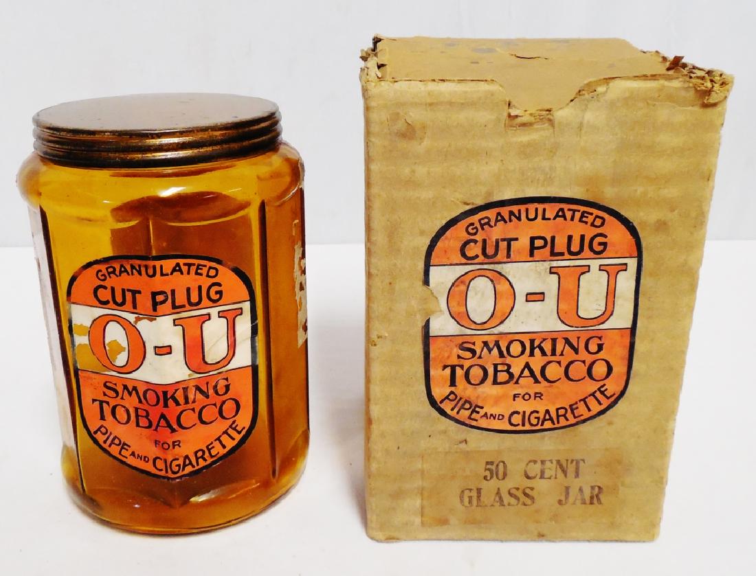 Cut Plug O-U Glass Tobacco Jar: with original cardboard box and measures 7" H x 4 1/2" Diameter