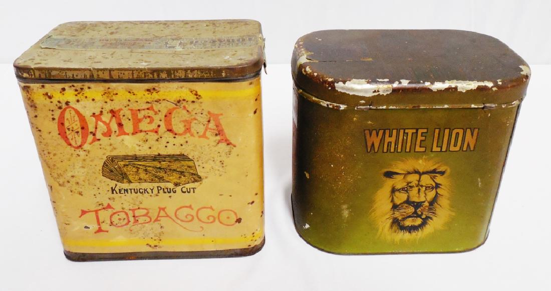 Lot of 2 Tobacco Canisters: Omega has a paper label and measures 6" H x 6" L x 3 3/4" W