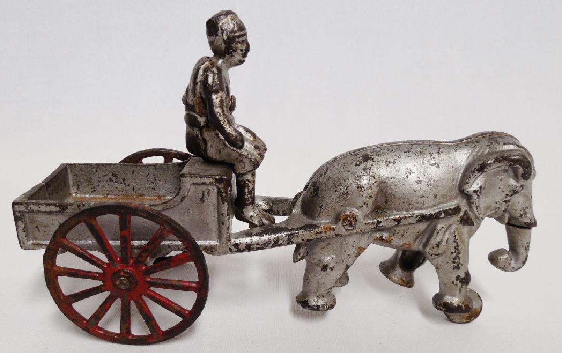 Cast Iron Elephant Drawn Cart with Man: measures 7 1/2" L