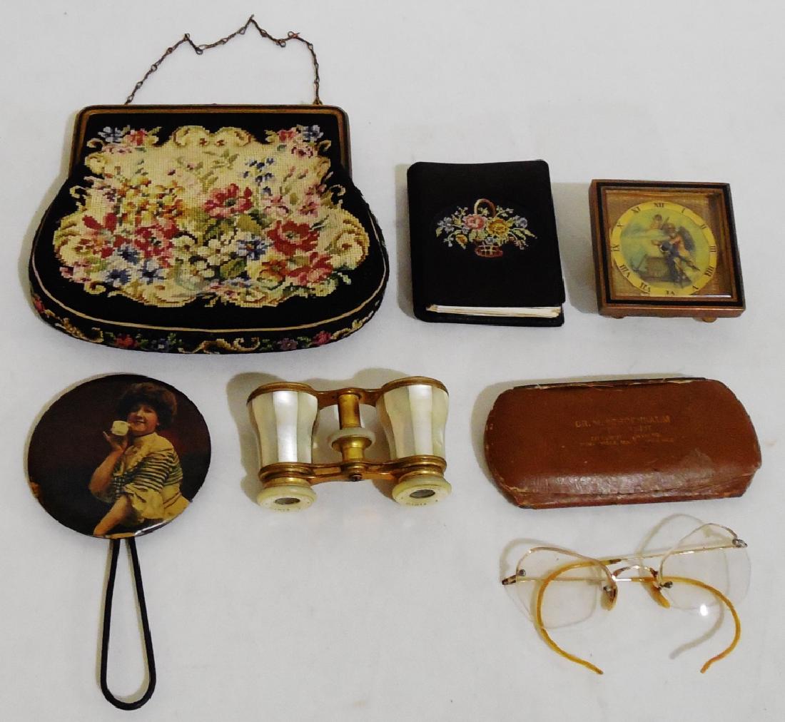 Assorted Lot: cloth purse (Made is Austria) NOTE: SILK LINING IS BEGINNING TO TEAR, cloth photo album with black and white pictures, alarm clock, mirror, opera glasses (marked Paris), and glasses (marked 1/10 12KGF