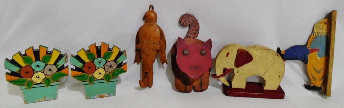 Lot of 6 Wood Folk Art Pieces: flower pot bookends, Eagle coat rack with moving wings, cat wall plaque, elephant, and 2 sided clown wall hanger measures 12 1/2" H