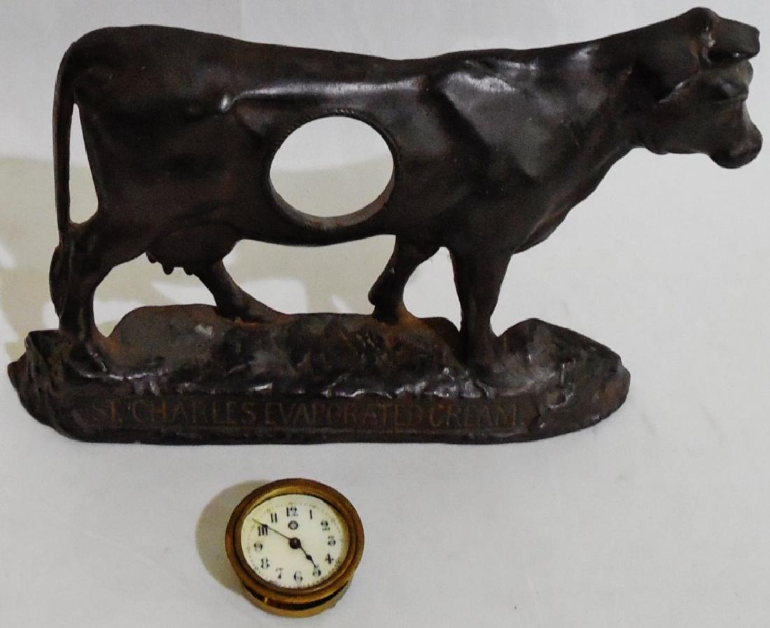 New Haven Clock Co. #299 Advertising Clock: cast iron, Charles Evaporated Cream, measures 13" L x 9" H, NOTE: CLOCK COMES OUT AND IS MISSING GLASS FRONT, UNTESTED