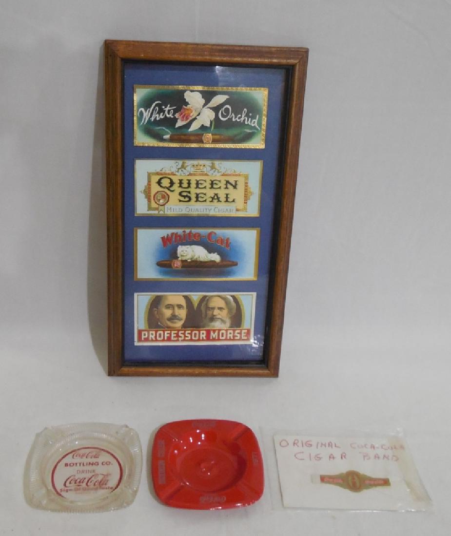 Assorted Cigar Lot: Coca Cola Cigar Band, 2 Ashtrays, and other framed cigar labels measures 14 1/2" H x 8" W