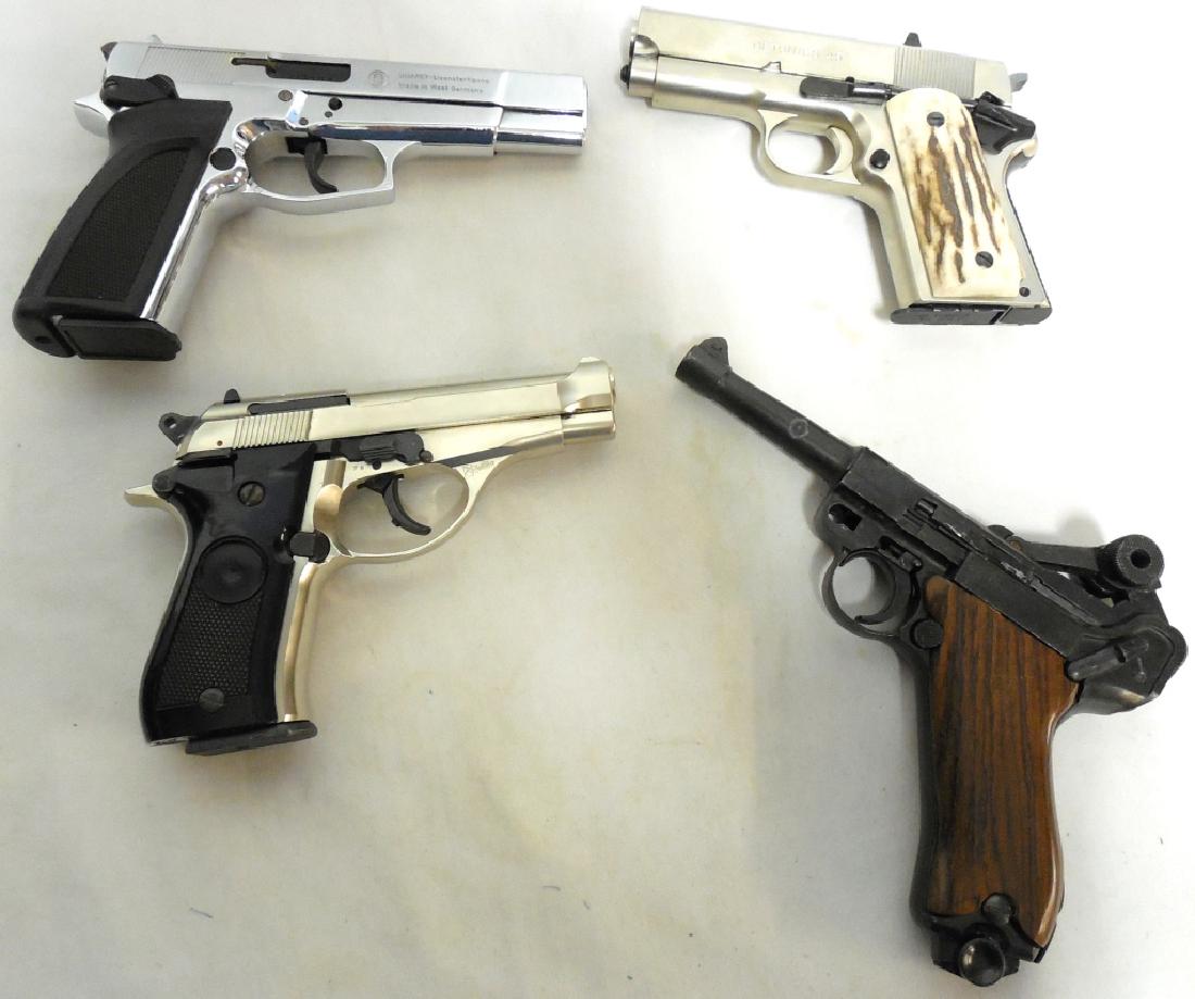 4 movie Prop Guns; 1 no name, 1 Browning mod GPDA8: 1 Detonics 45, 1 Rugger MUST PICK UP IN PERSON//NO SHIPPING