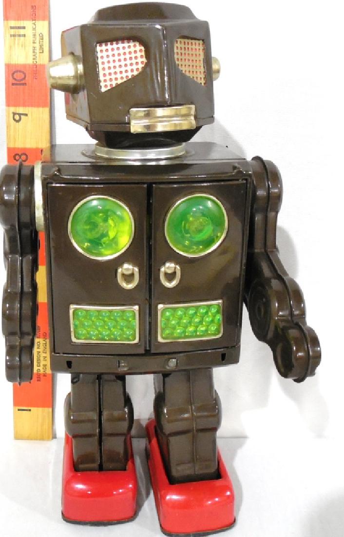 Japanese Tin Litho Robot, battery operated: Pop open Chest w guns, no box