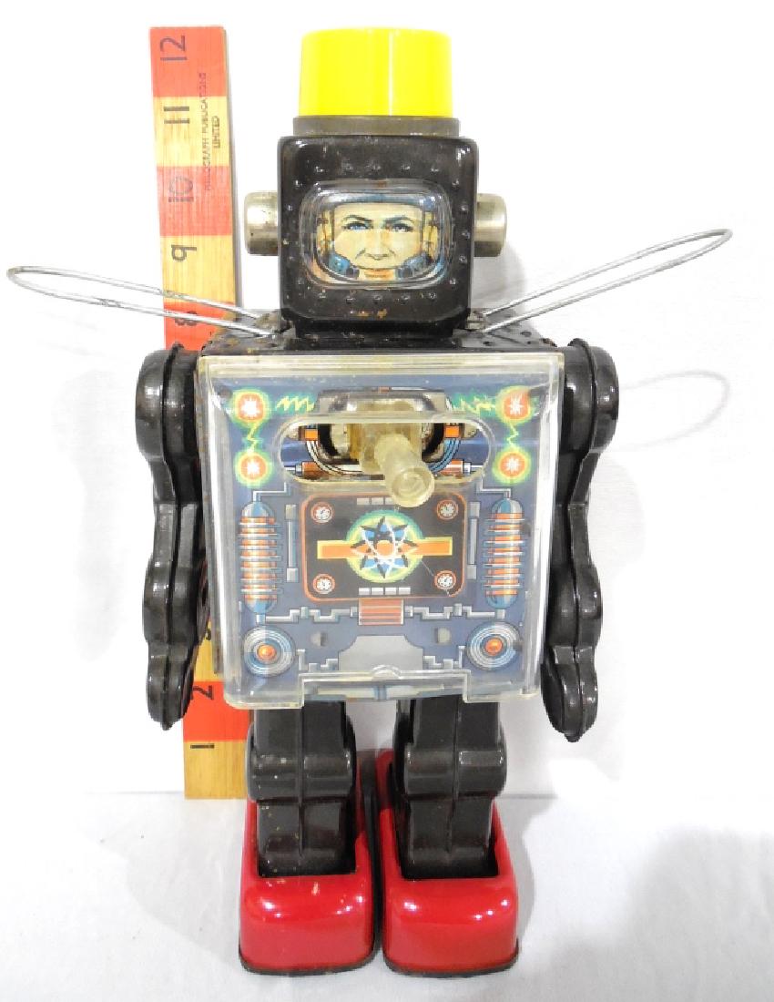 Japanese Tin Litho Robot Astronaut: gun in chest 1960s cracck in chest cove battery door missing hinge, see photo