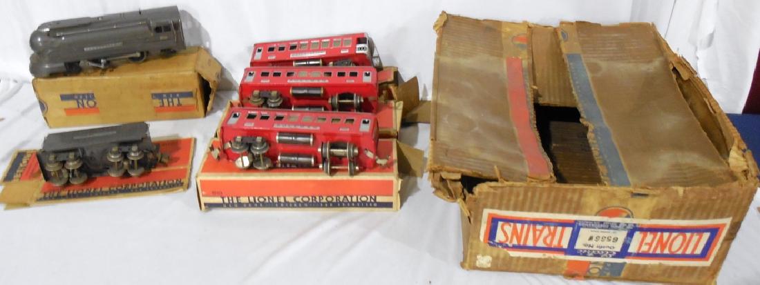Lionel Train Outfit No. 6566, O Gauge: Original boxes, 238E Bullet Nose Engine with 265W Whistling Tender, 2-610 Pullmans, 1-612 Pullman in red with silver roofs no tender box, 1 extra box, very good
