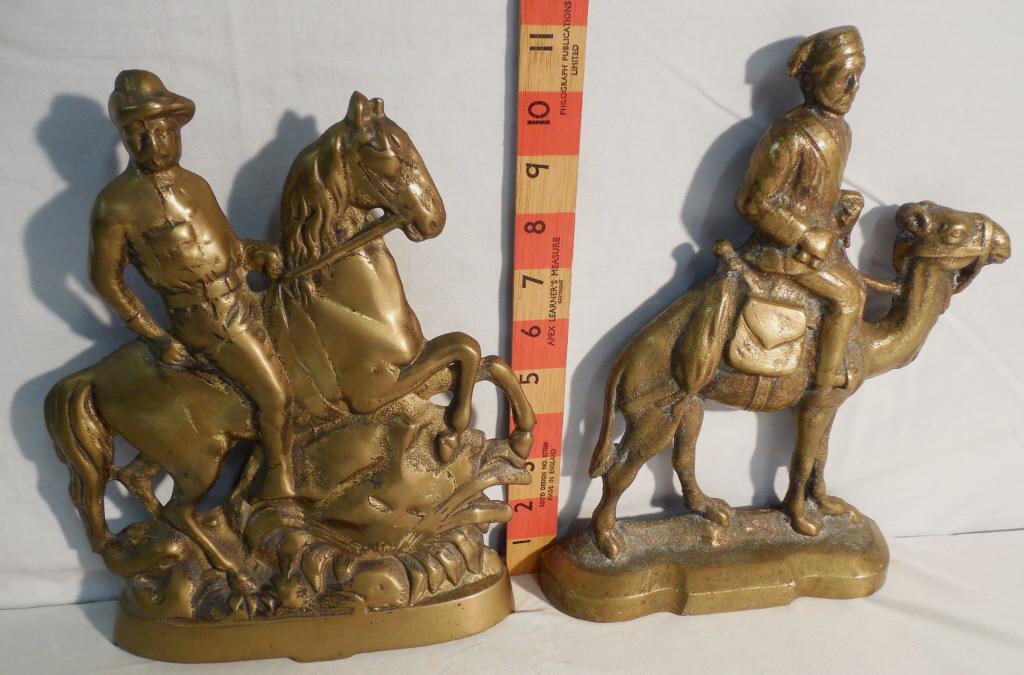 2 Brass door stops Teddy Roosevelt and Camel rider: 1 Teddy Roosevelt 10 1/2 inch tall and 1 11 1/4 inch tall man on camel