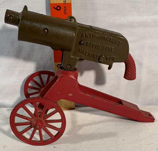 Anti-aircraft Rapid Fire Machine gun Cast-iron: Cast-iron made by Gary iron castings Makes a clicking sound when you turn the handle