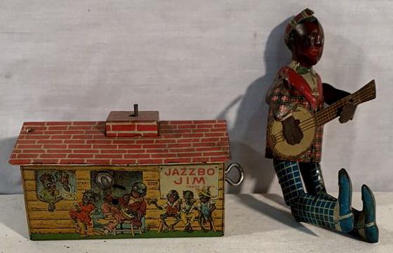 Jazzbo Jim Wind-up Toy missing rod: Missing connecting rod does work banjo player