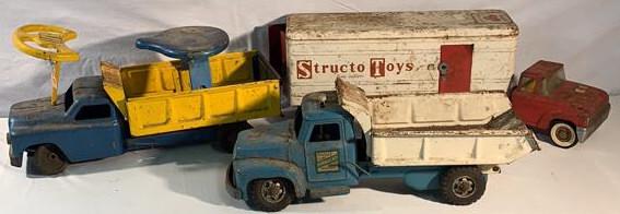 3 Trucks 2 Structo 1 Buddy L: 1 Buddy L Hydraulic 1 Structo Truck and Trailer and 1 Structo Rider Dump as is see photos rust and missing parts