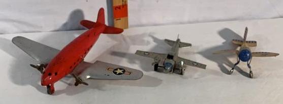 3 Toy Airplanes Marx - Arnold West Germany: Red and Silver Marx - Arnold West Germany A-755 and a Yellow and Blue NC 9001 wood and metal plane the Arnold is missing it’s Gun