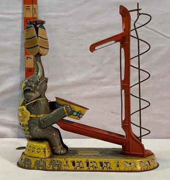 Joseph Wagner Tin Litho windup circus elephant: Missing balls and top cap on ball lift used as is see photos working