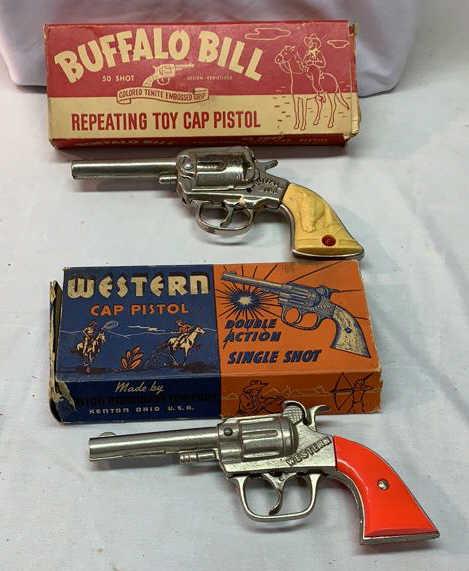 Buffalo Bill & Western Cap Pistols with Box: 1 J & E Stevens Buffalo Bill Cap Gun and 1 Kenton Hardware Western Cap Gun Boxes in Fair condition used as is see photos