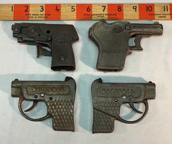 4 Cap Pistols 1 Kilgore 1 Andes 2 National see: photos 1 Kilgore OH Boy 1 Andes Master 2 National Used as is see photos