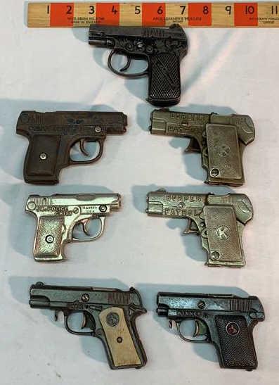 Mixed lot of 7 Cap Guns see Description: Used as is see photos not all working 1 National 2 Kilgore 2 Kenton 2 Hubley