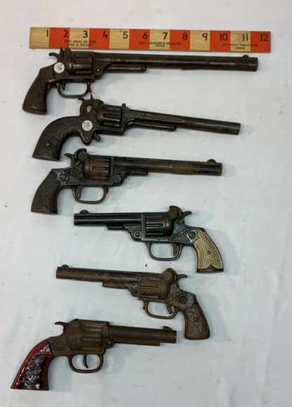 6 Stevens Cast-iron Cap Guns: Used as is see photos Long barrel - Hi Ranger - Western - Marine - Kit Carson and Buffalo Bill Some rust