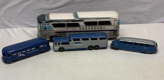 4 GREYHOUND BUSES: used as is see photos Tootsie toy and other some may have some restoration