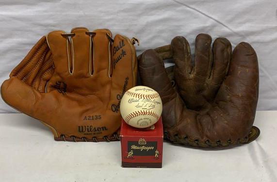 2 Wilson baseball gloves one McGregor baseball: used as is see photos