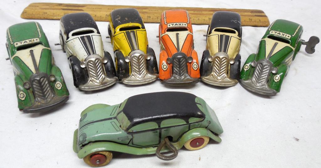 7 Lindstrom and Marx wind-up tin litho Cars: Not all working Used see photos