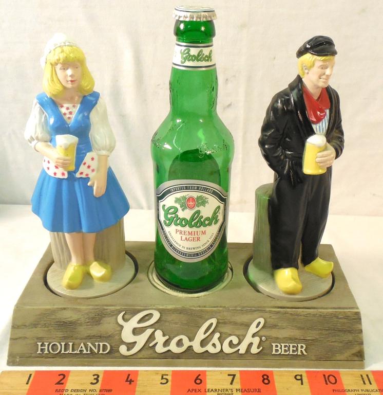 GROLSCH BEER Counter Display: Dutch Man and Girl with Bottle 10in. Tall Plastic used as is see photos