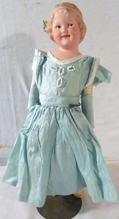 German China Doll w/cloth body marked 7650 (1 of 3)