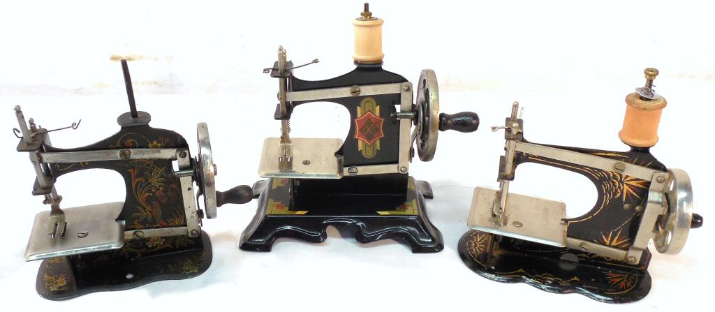 3 Tin Sewing Machines-1 Made in Germany: 2 withTags # 530489 & #90060, slight paint loss-As is-See Photo