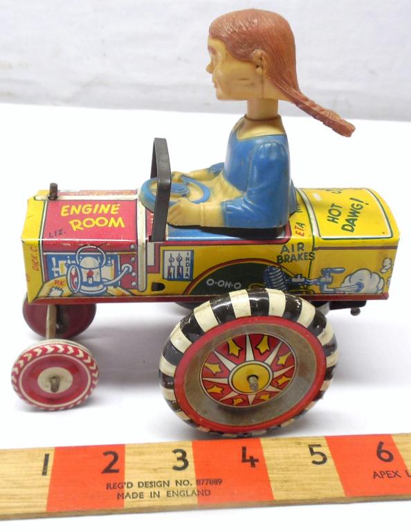 Tin /Plastic Wind up Tractor Marx: Girl is Plastic /Tractor is Tin Working