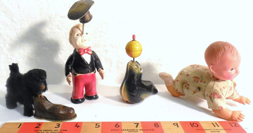 Baby/ Man w/ Hat Wind Ups  Friction Seal Dog (1 of 8)
