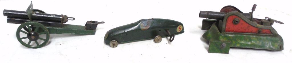 Lot of 3 Wind-Ups 2 Cannons / 1 Race Car all tested and: all tested and working used as is see photos