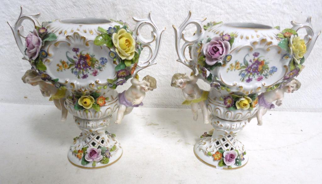 Pair of Cherub Vases As IS Wings broken off 1 each: Wings broken off 1 each vase, 1 vase chipped on base see photos 8'' tall Used as is see photos No In House Shipping for this item