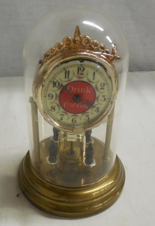 Coca-Cola Miniature Anniversary Clock plastic dome,: plastic dome, winds but does not run note small coke bottles on pendulem