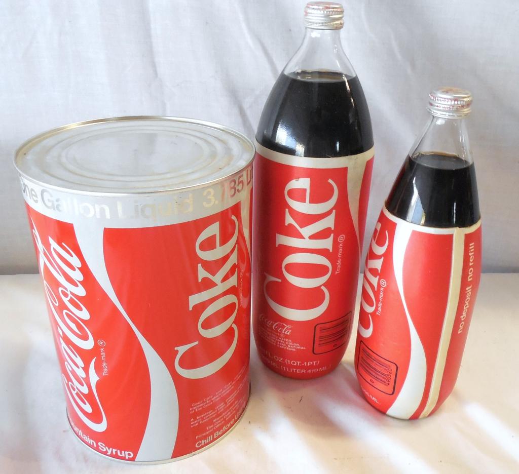 Gallon Coke Syrup Can / 2 Full Bottles of Coke can: can sealed never opened but empty / bottles styrofoam sleeves never opened
