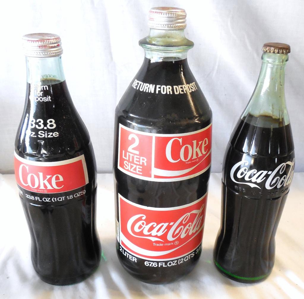 Lot of 3 Bottles of Coke Never Opened see photos: see photos