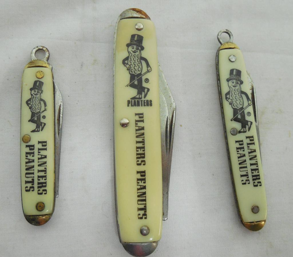 3 Planter Peanuts pockknives small rust on back of (1 of 3)