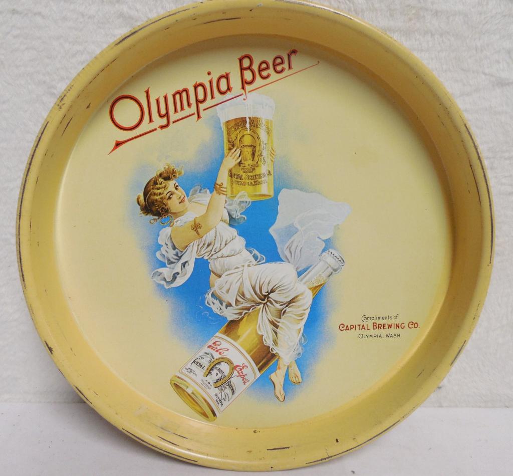 Olympia beer tray worn on edges and back, 13" round: worn on edges and back, 13" round