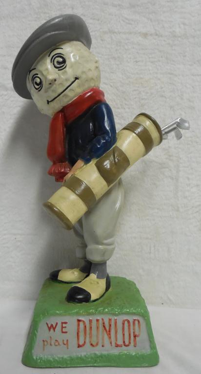 Dunlop golfer w/ 3 clubs composite, glubs are made to: composite, glubs are made to slide out of bag