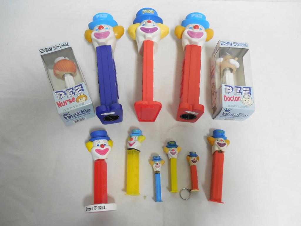 11 assorted Pez items dispensers, banks, bobbleheads, & (1 of 5)