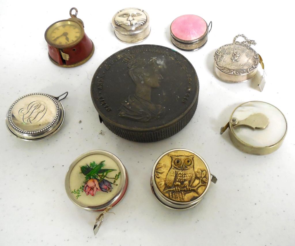 Lot of 9 Mini Ornate Tape Measures see photos: see photos