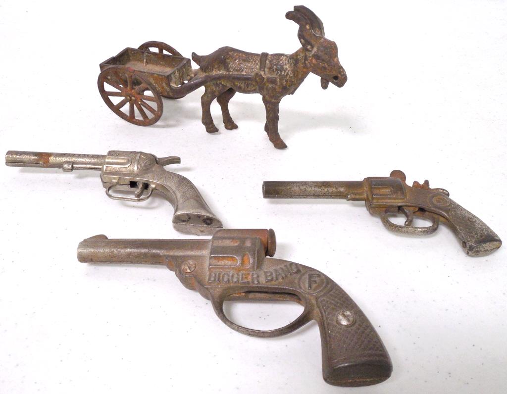 3 metal guns & metal goat wagon all have a lot of wear,: all have a lot of wear, one gun missing trigger, one gun marked Hubley