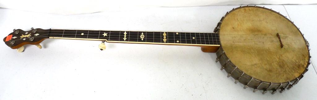 4 String Supertone Banjo all strings intact see photos: all strings intact see photos Pick up or 3rd party shipping only – Call Postal Connections at (717) 718-1773 for Shipping quote