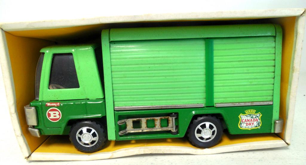 Buddy L Jr. Canada Dry Delivery Truck in box: 4 soda crates in truck--may be more in other side. Truck and hand truck show small rust spots. As is. See photos.