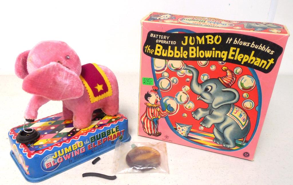Battery Operated Jumbo Bubble Blowing Elephant: w/ box, untested, has dried up bubble solution and a broken rubber hose, toy rattles when you shake it, some fur has small stains, hole on box lid flap, Made in Japan