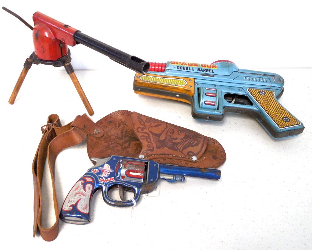 4 toys cannon, tin Space Gun, Tin Red Ranger gun: Red Ranger holster also, tip of space gun broken, all show some wear, fading colors