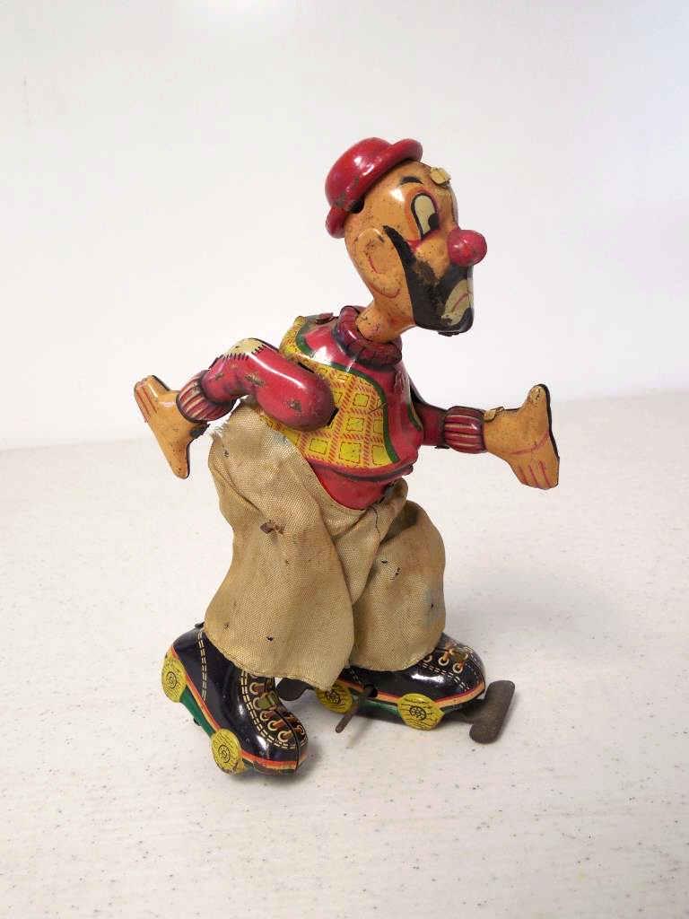 TPS Japan Tin Wind Up Toy Hobo: untested, back of pants torn around waist, small holes on other parts of pants, paint wear especially on face and arm