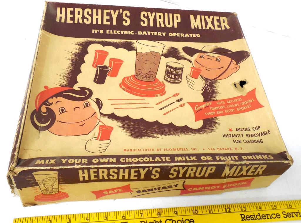 Hershey's Syrup Mixer: lid has hole,broken corners,has contents,not tested