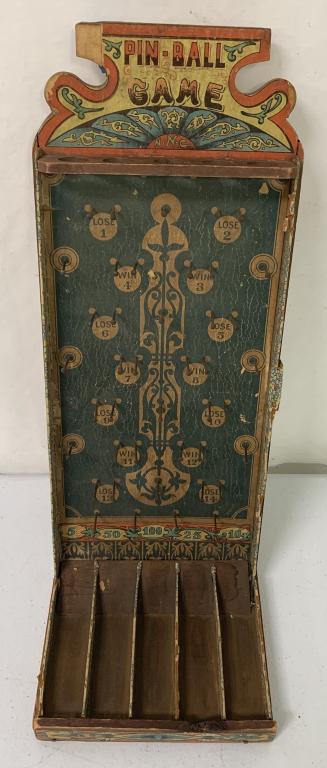Wooden Pin-Ball Game: N.N.C.top corner broken,cardboard side broken,as is,pieces may be missing